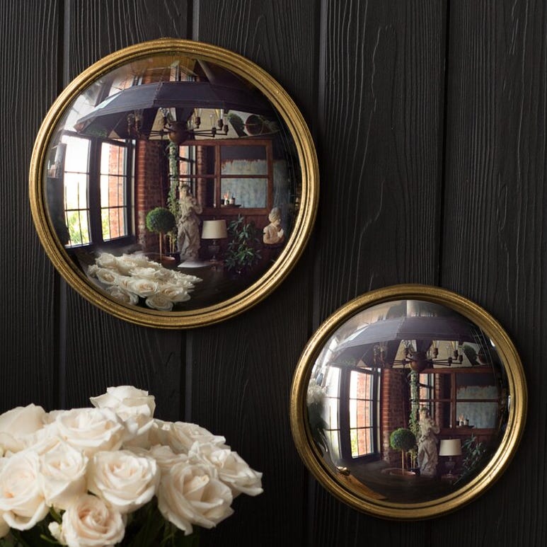 Sylvania Leaf Metal Bull Eye Accent Mirror