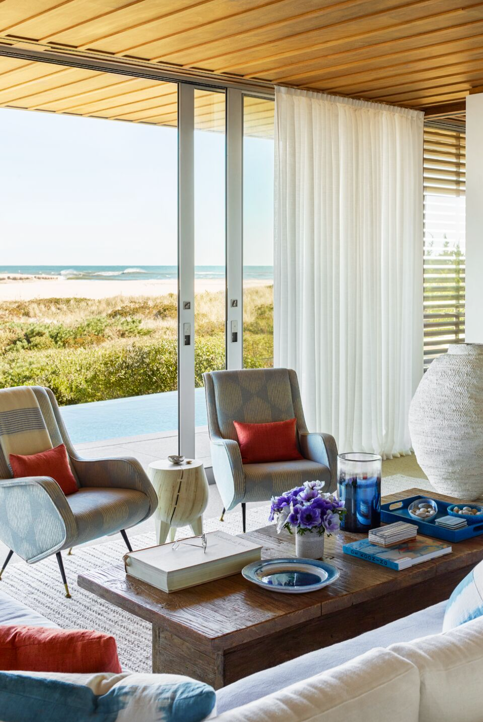 Stranden hjem med skyvedører